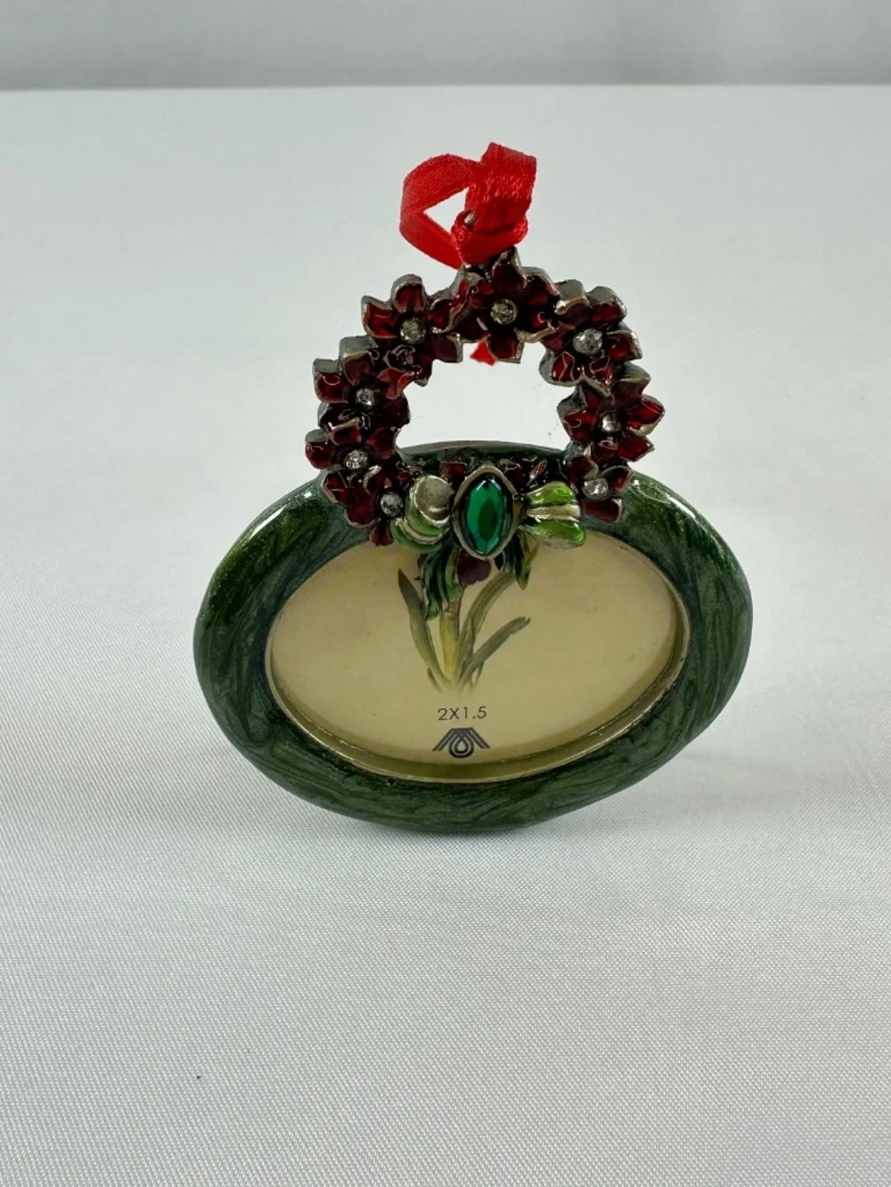 Enamel Red Poinsettia Wreath Christmas Ornament With Green Stone on Bow Frame